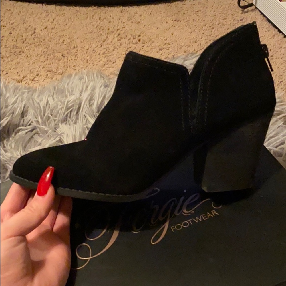 Black boots with a heel